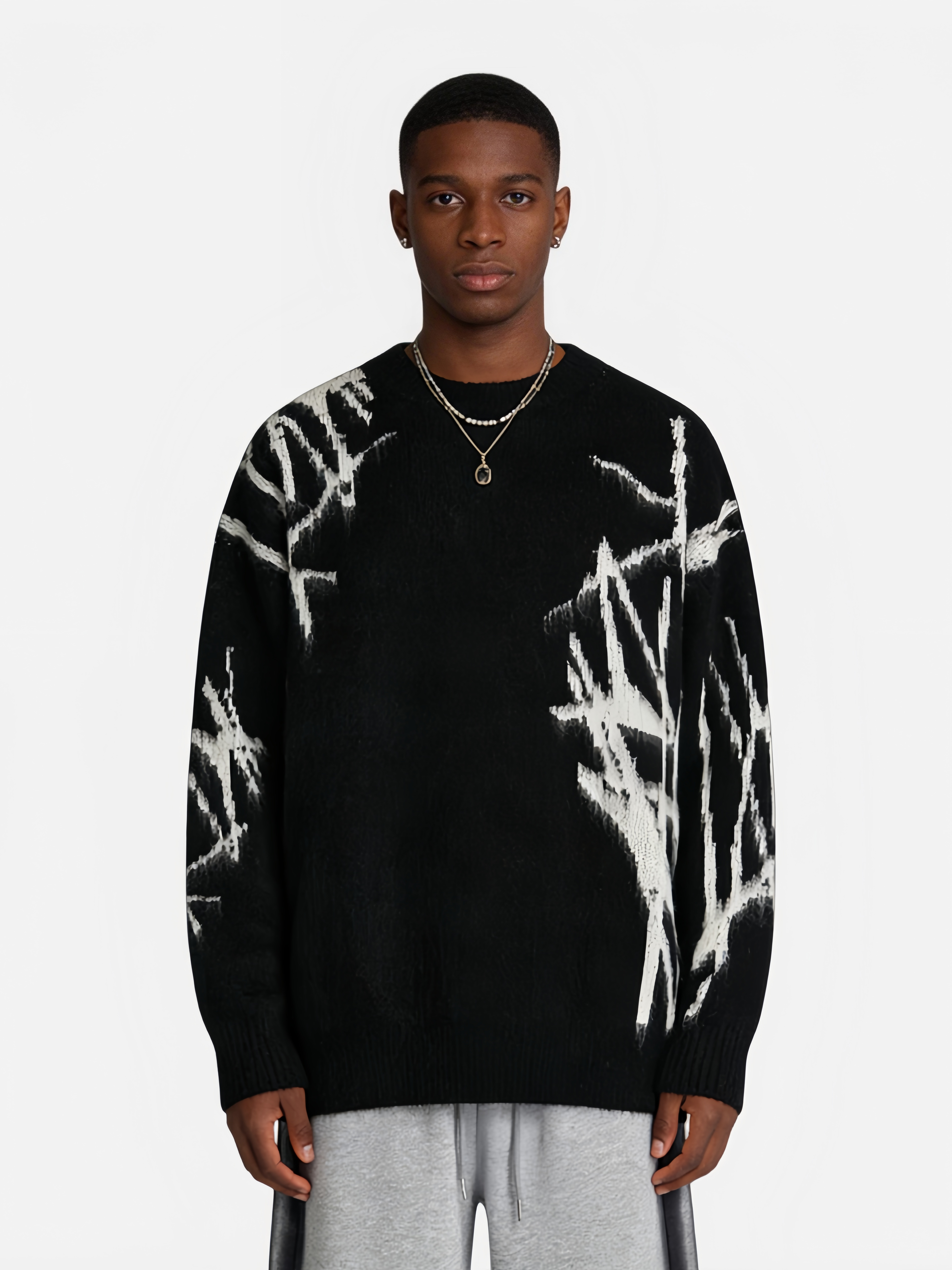 Pull à motif graffiti irrégulier Haaura